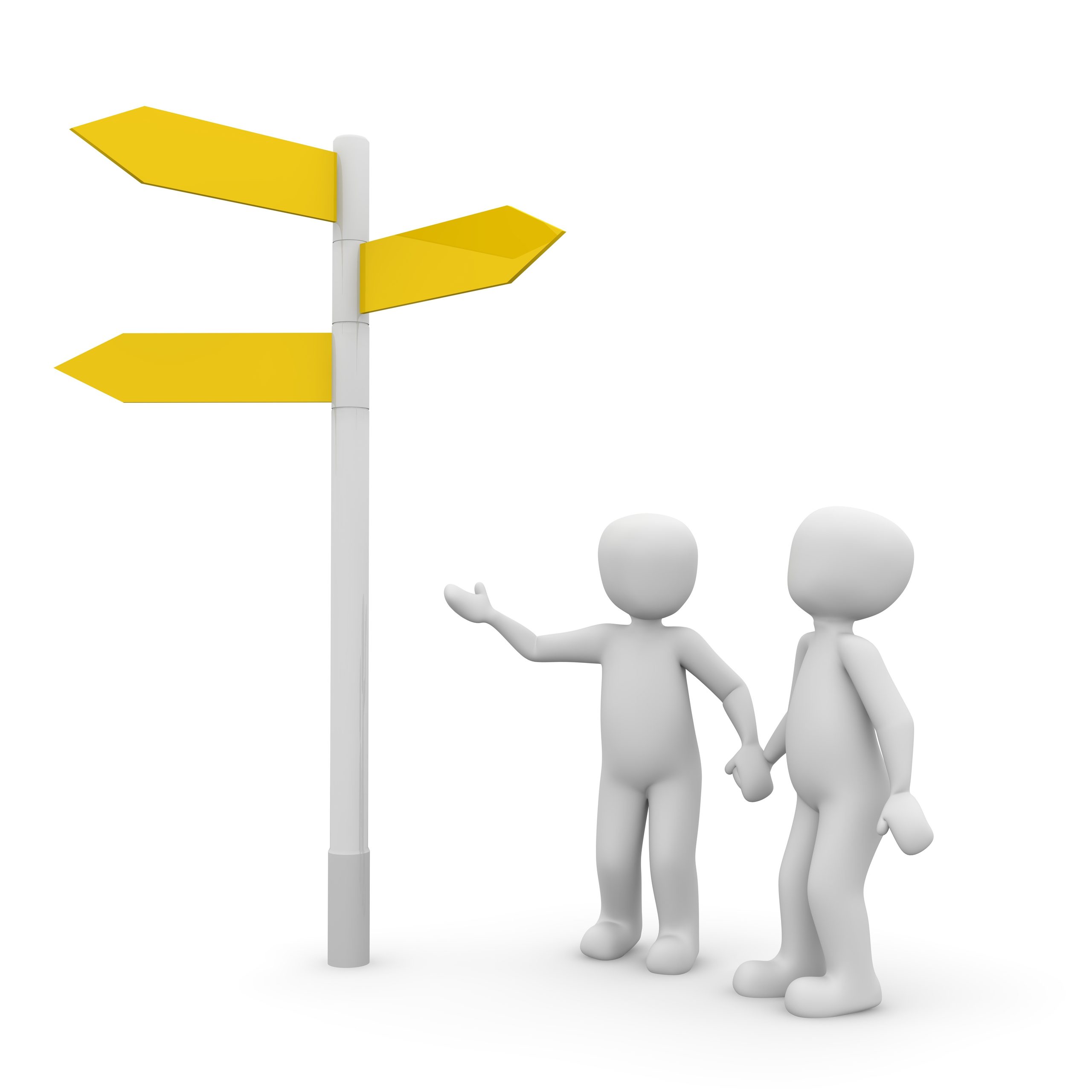 people at a directions sign